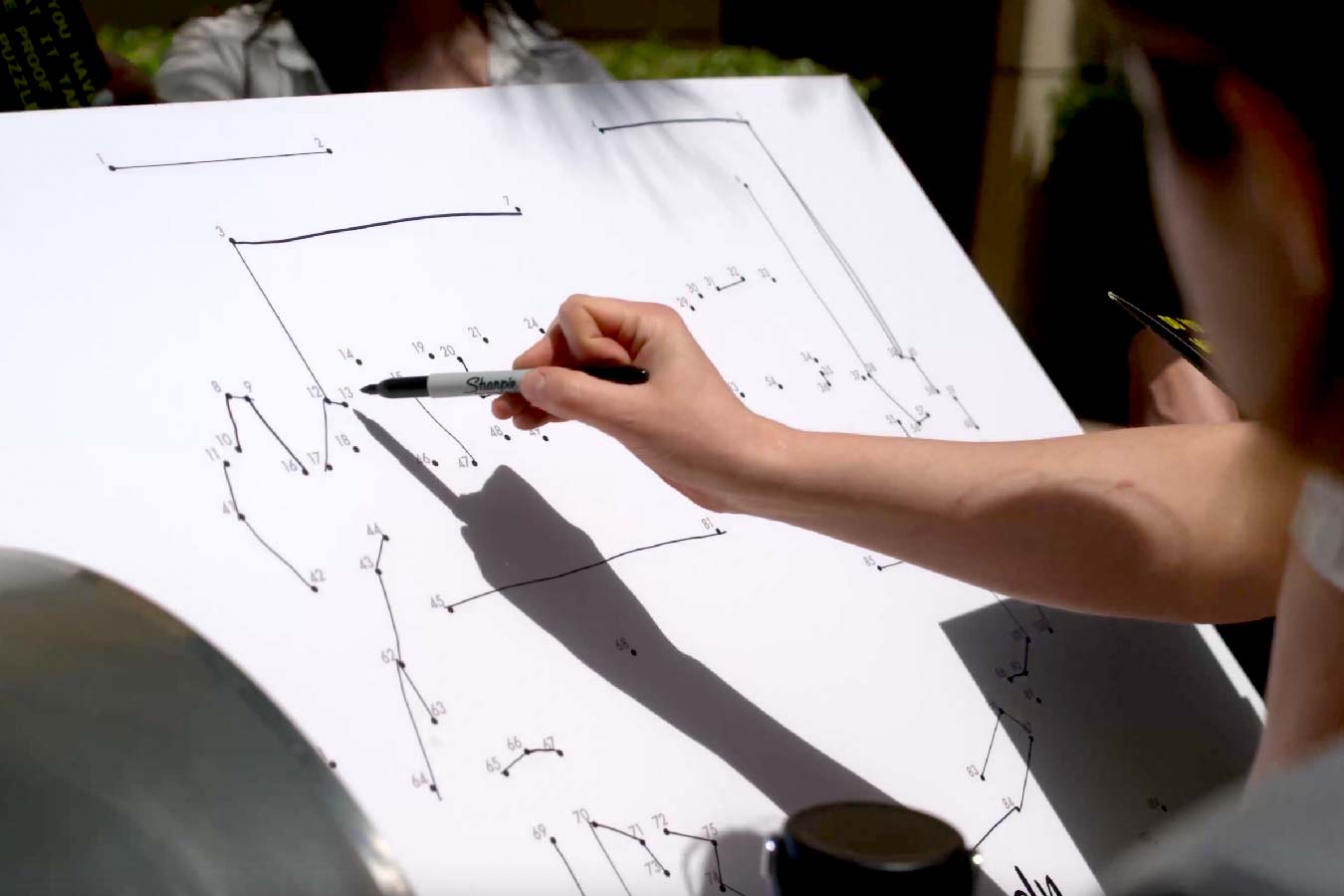 In-person team building challenge station